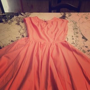 Coral colored knee length dress